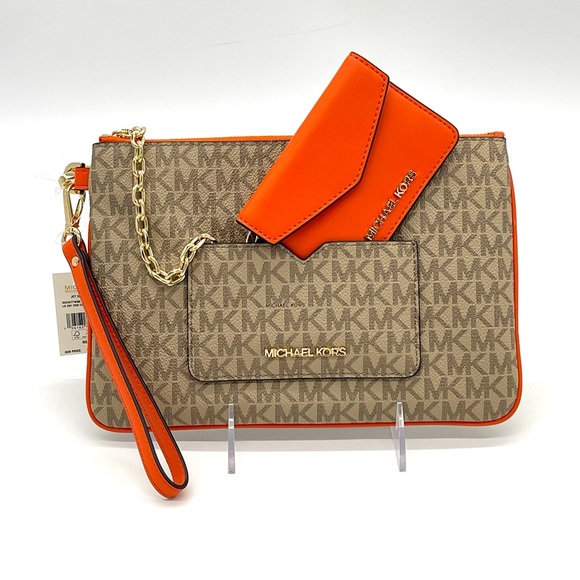 MICHAEL KORS JET SET ITEM LG 2 in
1 CARD CASE & WRISTLET - Picture 8 of 11